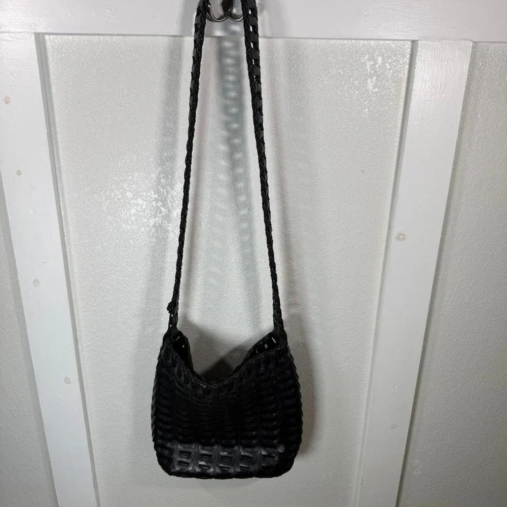 Black woven leather shoulder bag with strap